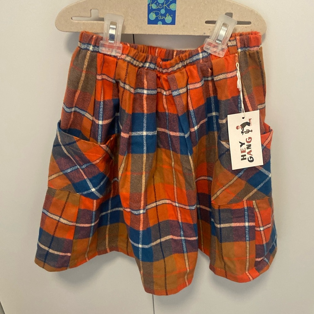 Hey gang flannel skirt with pockets. NWT